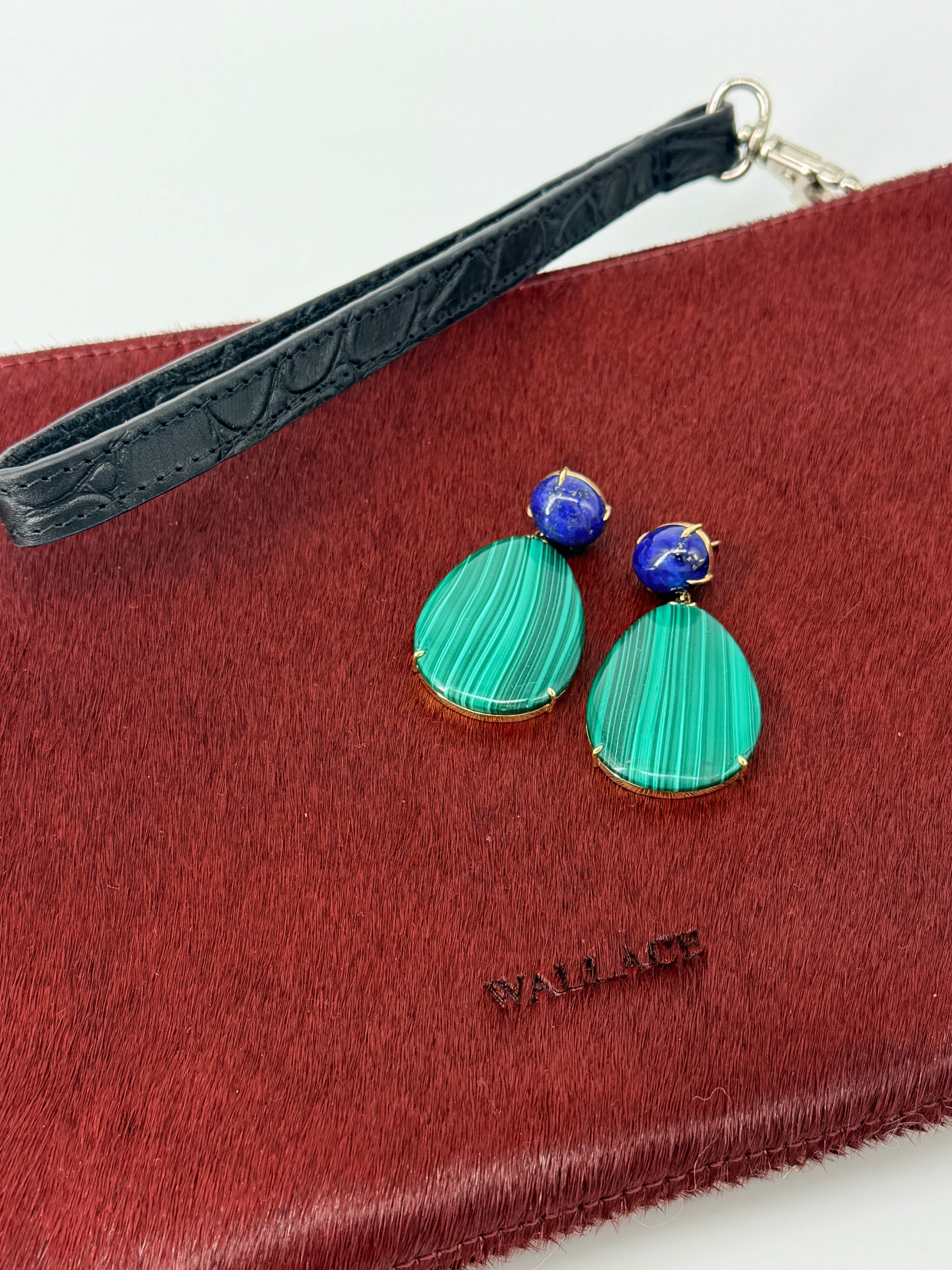SHAH AND SHAH MALACHITE AND LAPIS EARRINGS ON HAIRCALF WALLACE POUCH