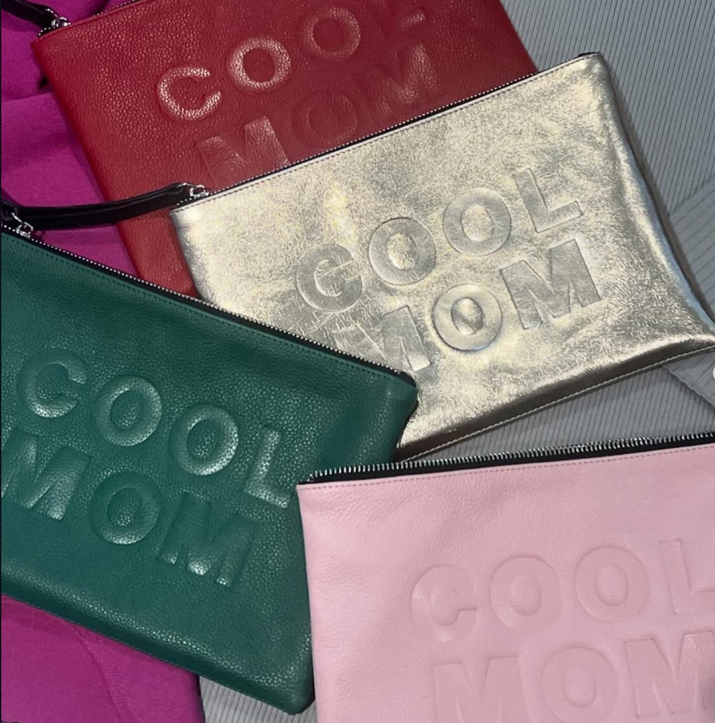 FLAT SLOGAN POUCHES BY KOFF
